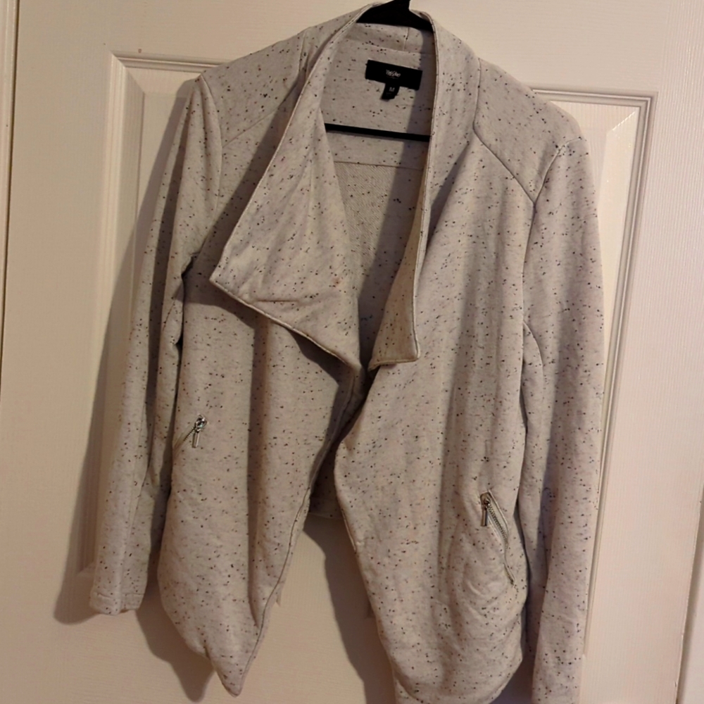 Gray spotted asymmetrical sweater with zipper pockets